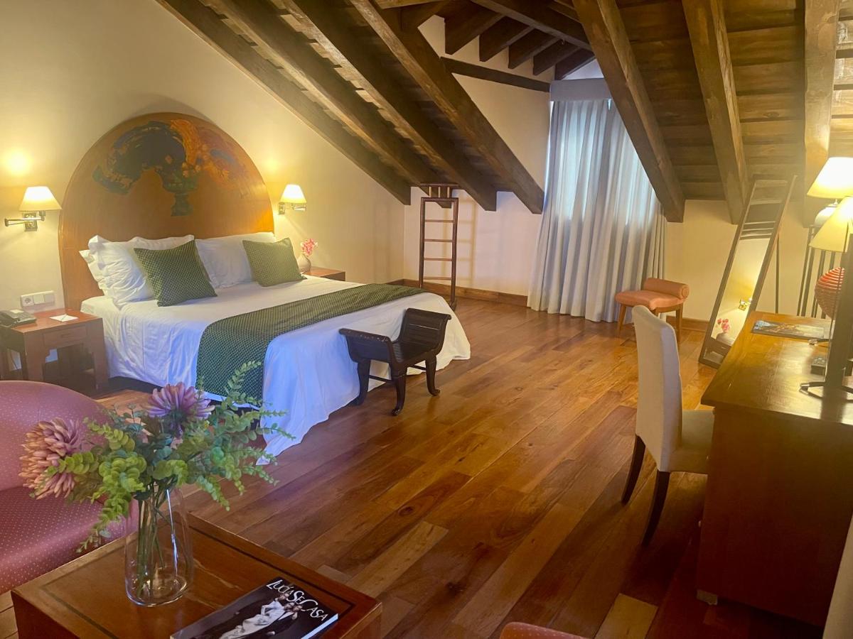 Cama o camas de una habitación en Hotel El Rancho