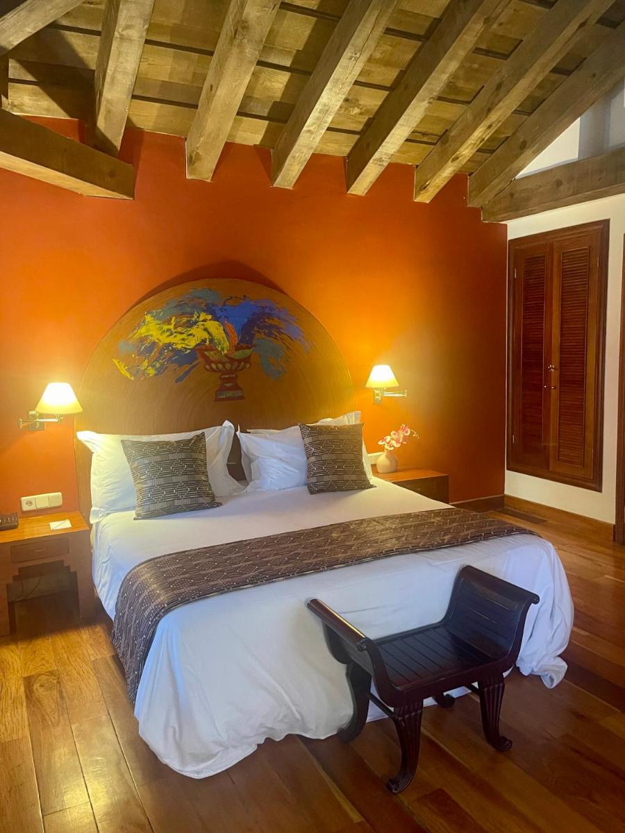 Cama o camas de una habitación en Hotel El Rancho