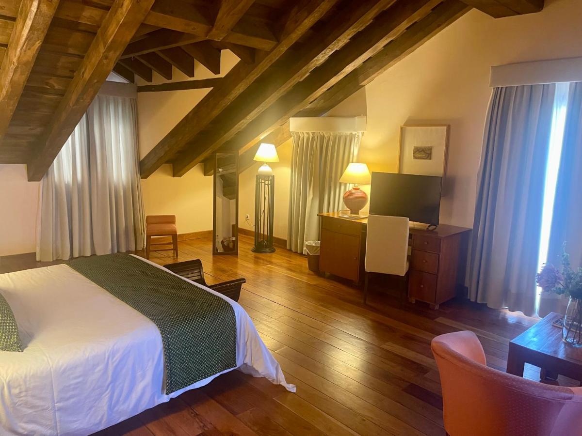 Cama o camas de una habitación en Hotel El Rancho