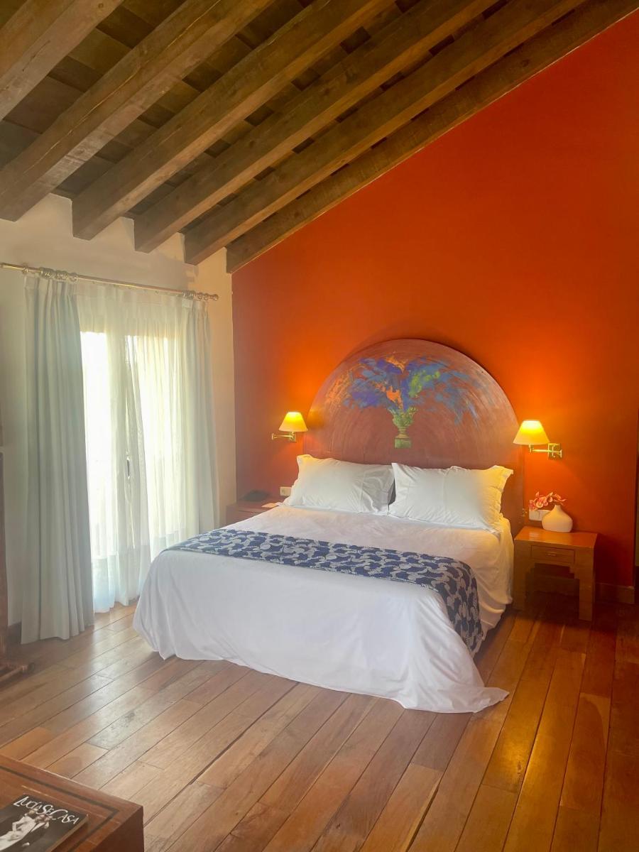 Cama o camas de una habitación en Hotel El Rancho
