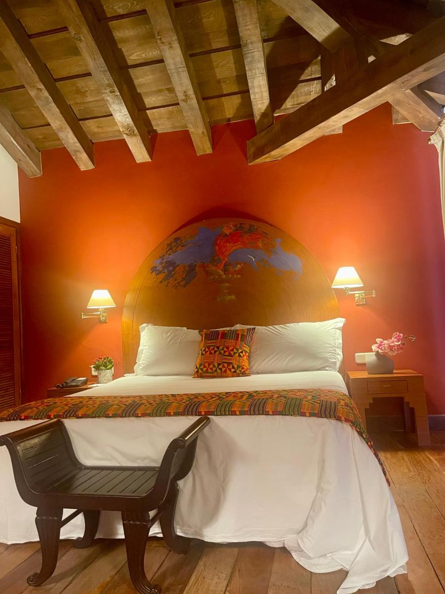 Cama o camas de una habitación en Hotel El Rancho