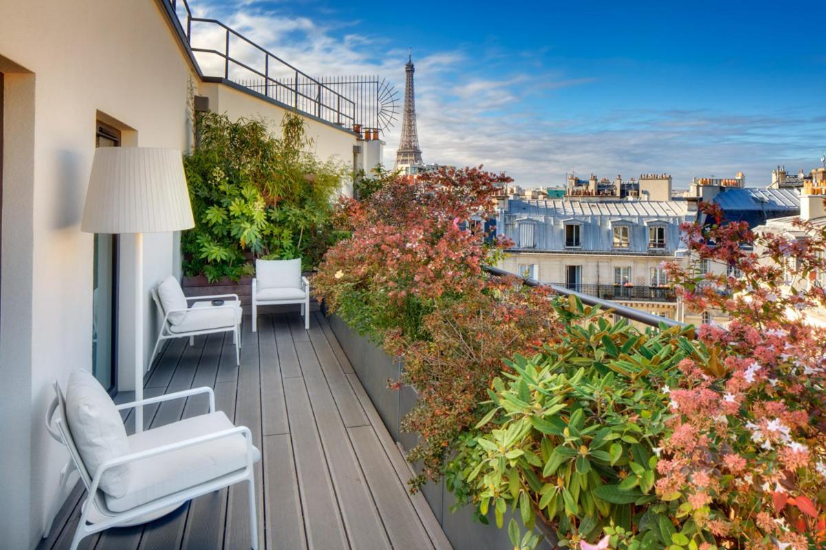 Balcon ou terrasse dans l'établissement Le Cinq Codet Balcon ou terrasse dans l'établissement Le Cinq Codet