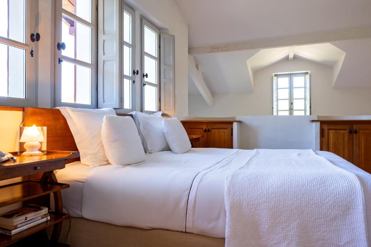Un ou plusieurs lits dans un hébergement de l'établissement Auberge Ostapé