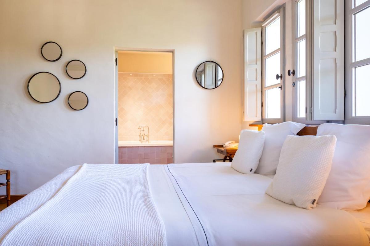 Un ou plusieurs lits dans un hébergement de l'établissement Auberge Ostapé