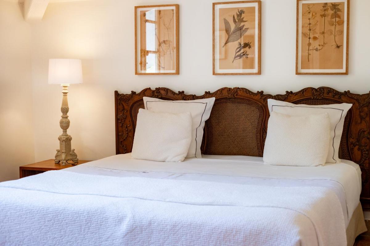 Un ou plusieurs lits dans un hébergement de l'établissement Auberge Ostapé