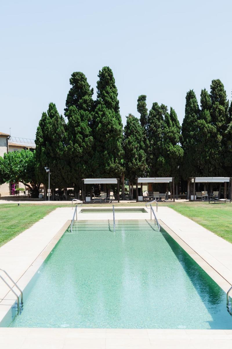 Piscina en o cerca de URH - Hotel Molí del Mig