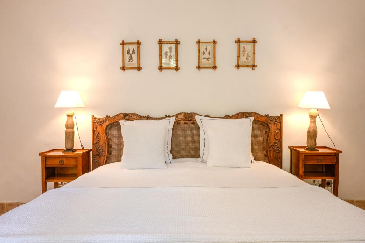 Un ou plusieurs lits dans un hébergement de l'établissement Auberge Ostapé
