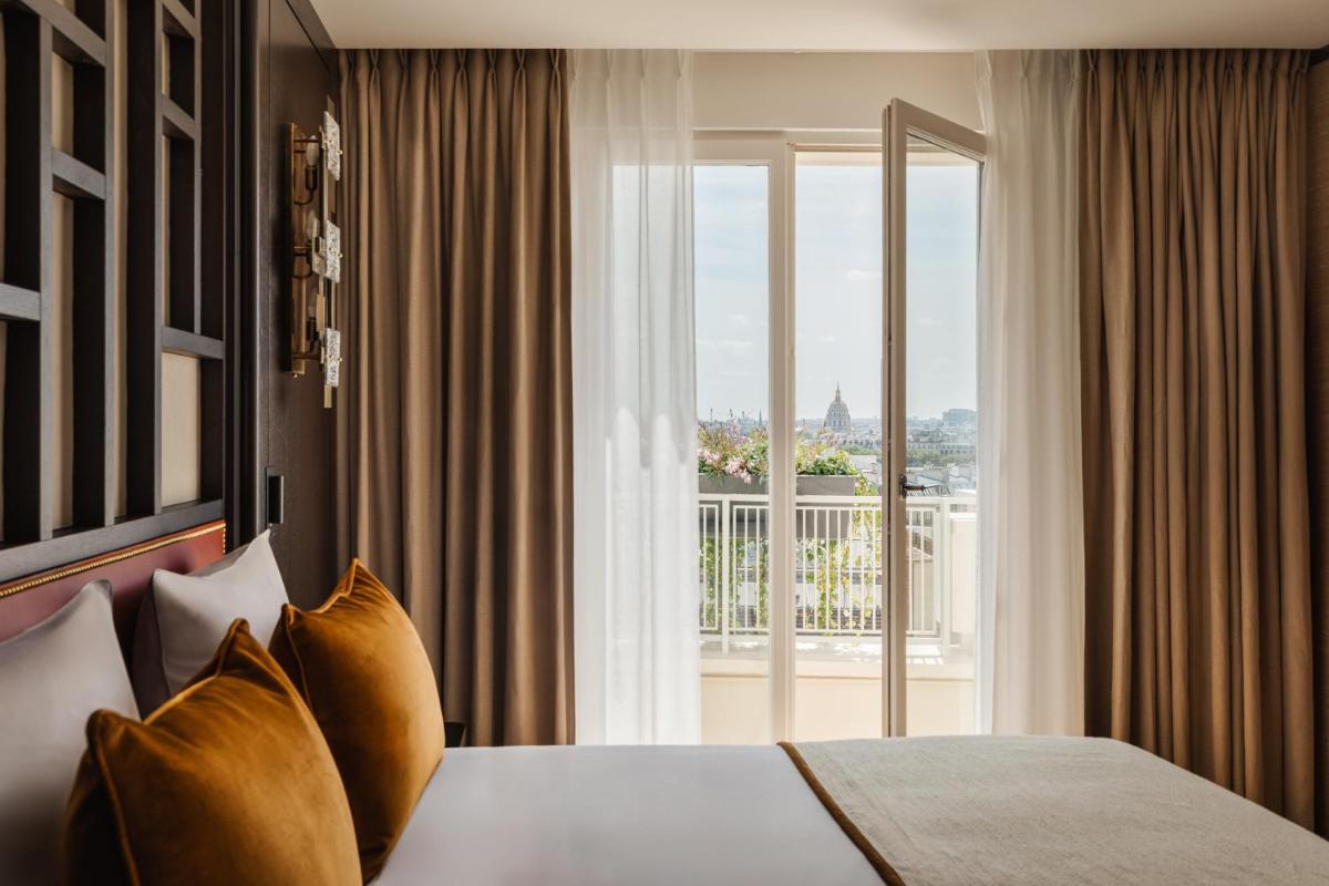 Un ou plusieurs lits dans un hébergement de l'établissement Hôtel De Sers Champs Elysées Paris