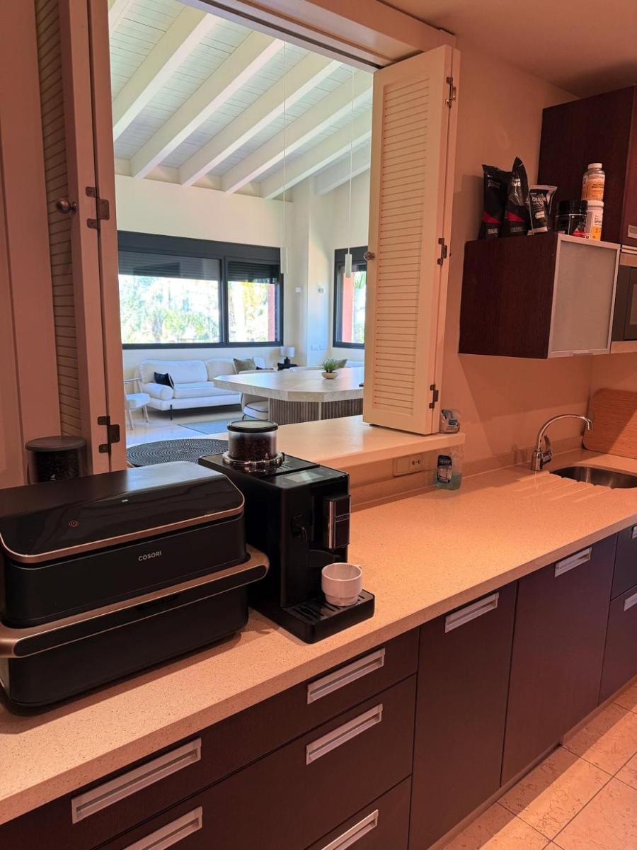 Una cocina o zona de cocina en Aparthotel Novo Resort