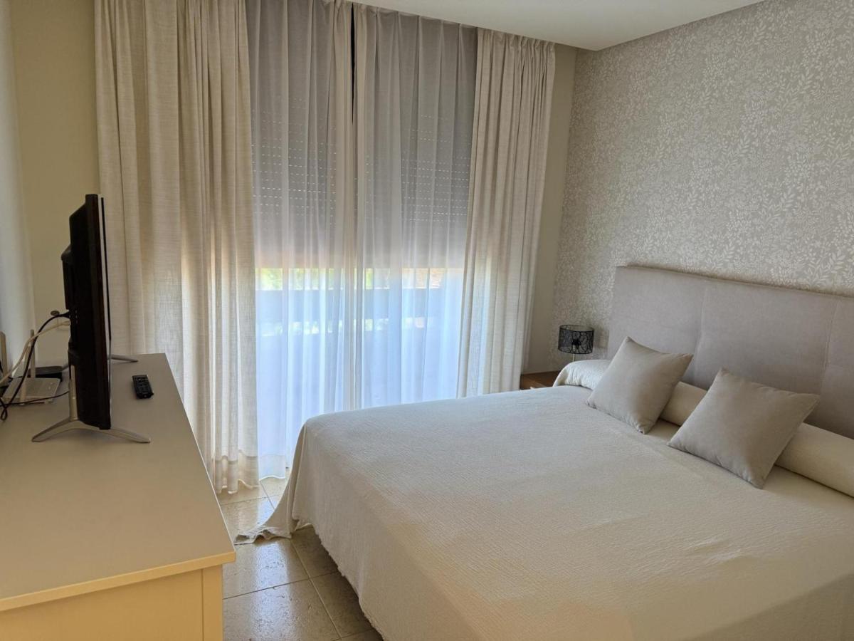 Cama o camas de una habitación en Aparthotel Novo Resort