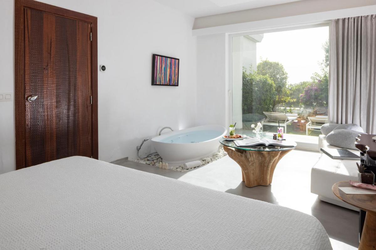 Cama o camas de una habitación en Hacienda Na Xamena, Ibiza