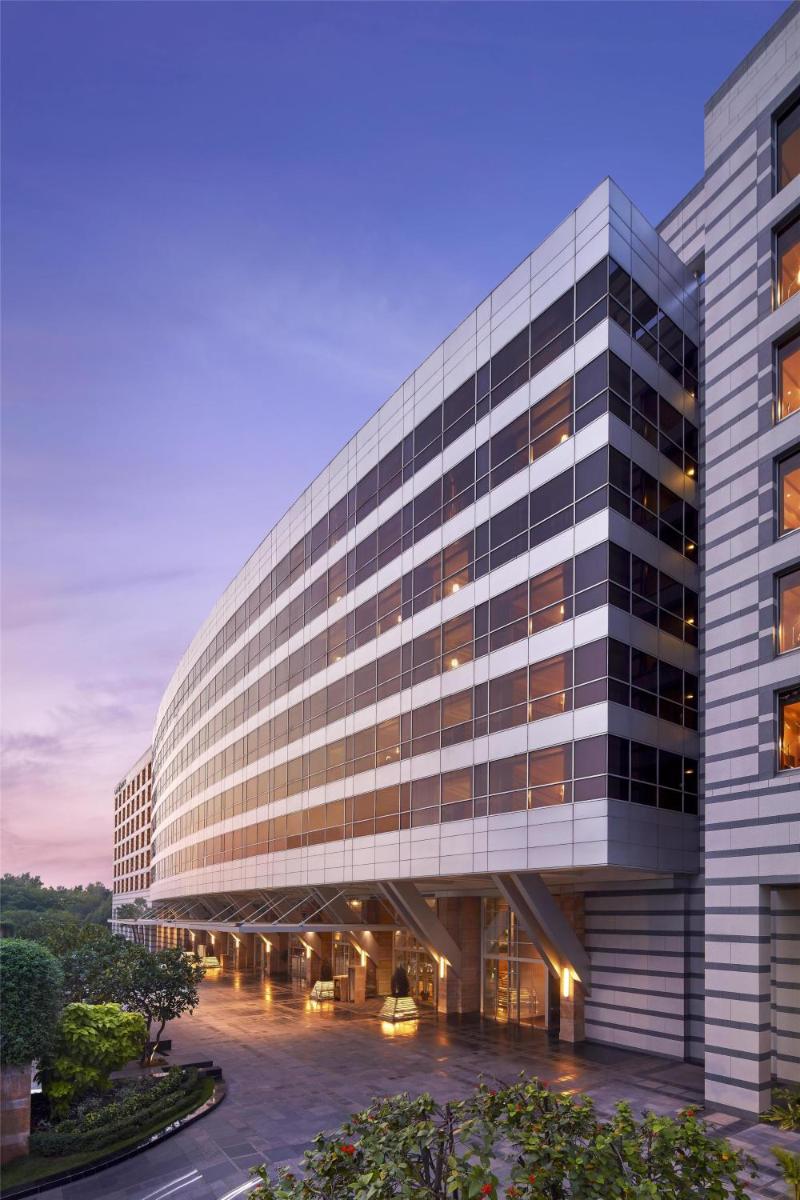 an office building with a large building at Grand Hyatt Mumbai Hotel and Residences in Mumbai