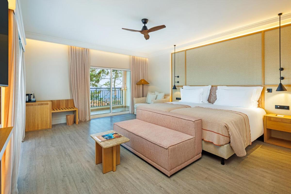 Uma cama ou camas num quarto em PortoBay Blue Ocean