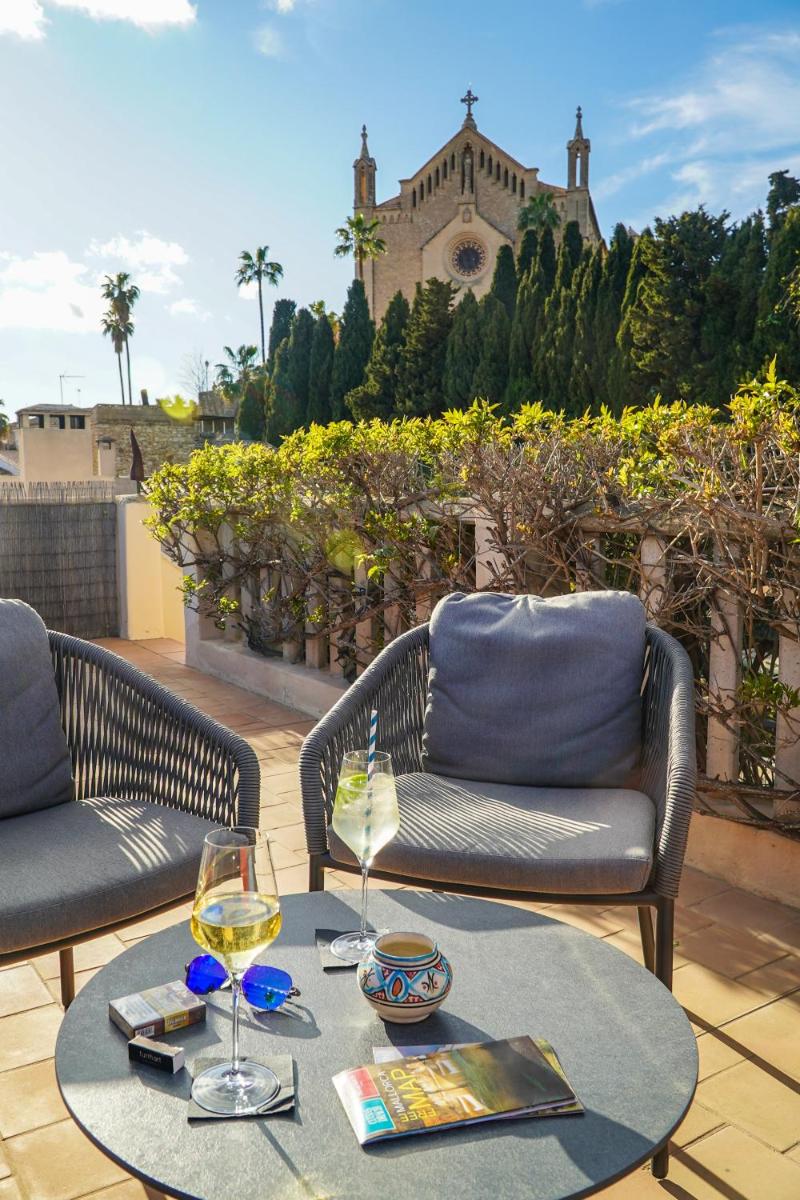Zona de estar de Hotel & Restaurant Jardi d'Artà