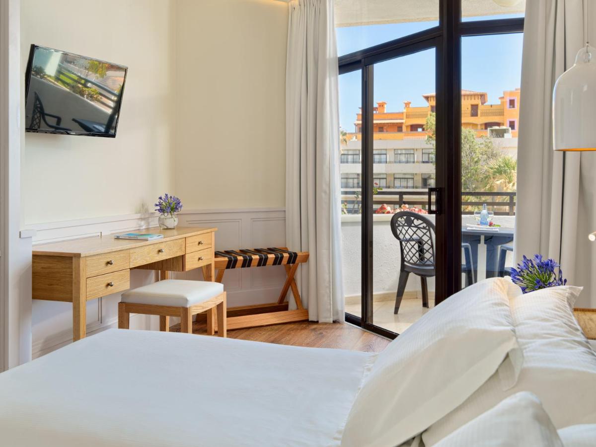 Cama o camas de una habitación en H10 Conquistador