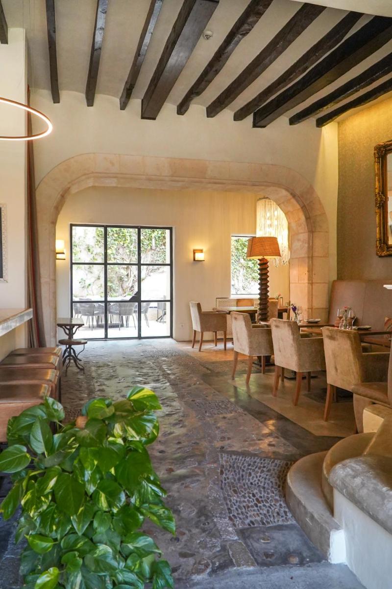Zona de estar de Hotel & Restaurant Jardi d'Artà