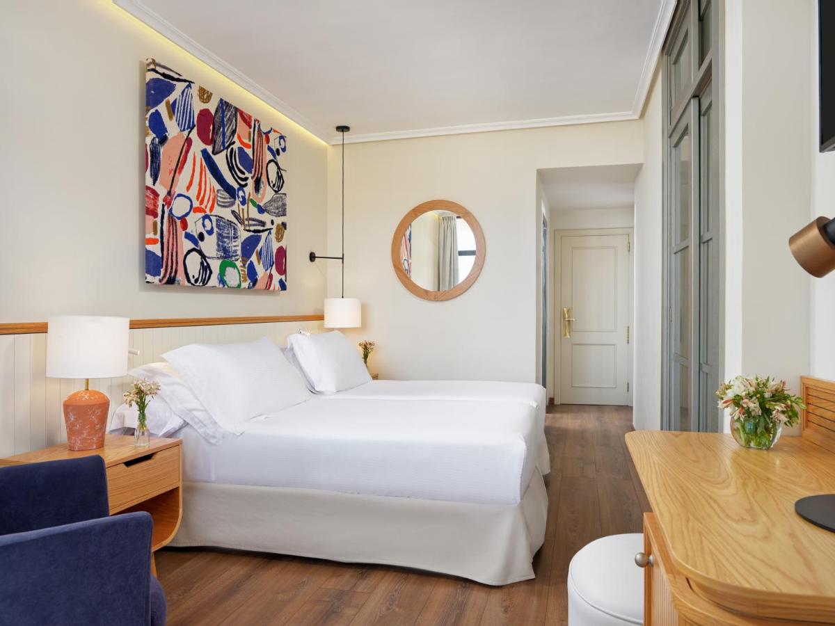 Cama o camas de una habitación en H10 Conquistador