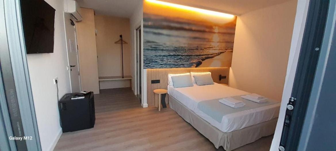 Cama o camas de una habitación en Alannia Salou