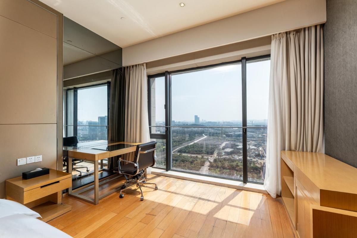 Snug Gaokong Jiangjing Hotel - Housity