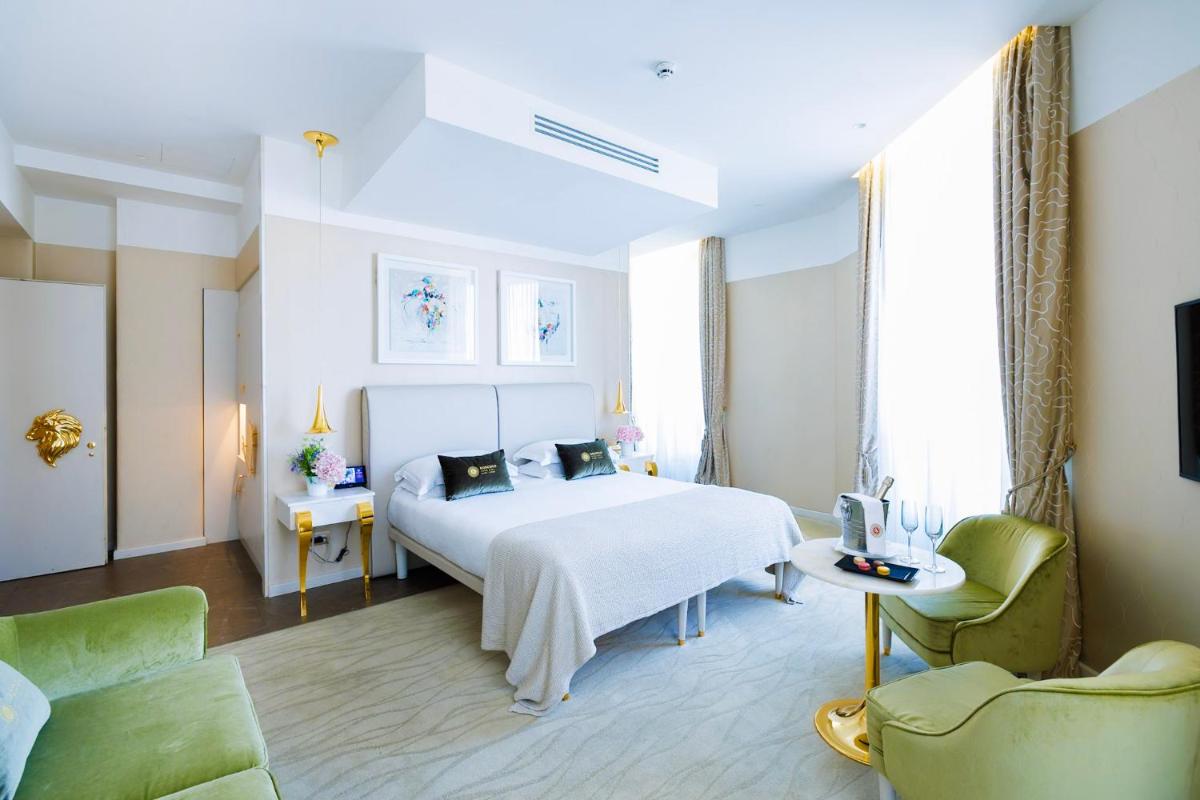 Un ou plusieurs lits dans un hébergement de l'établissement Boscolo Lyon Hotel & Spa