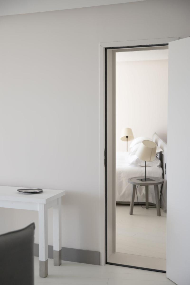 Un ou plusieurs lits dans un hébergement de l'établissement Hôtel Plage Palace & Spa