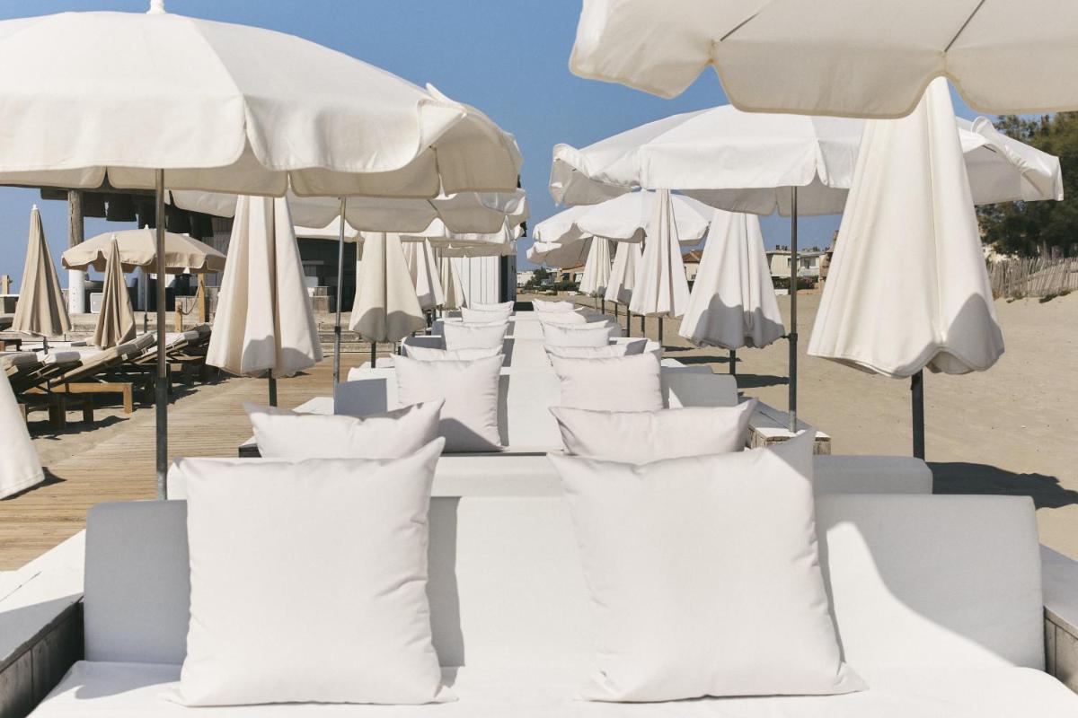 Coin salon dans l'établissement Hôtel Plage Palace & Spa