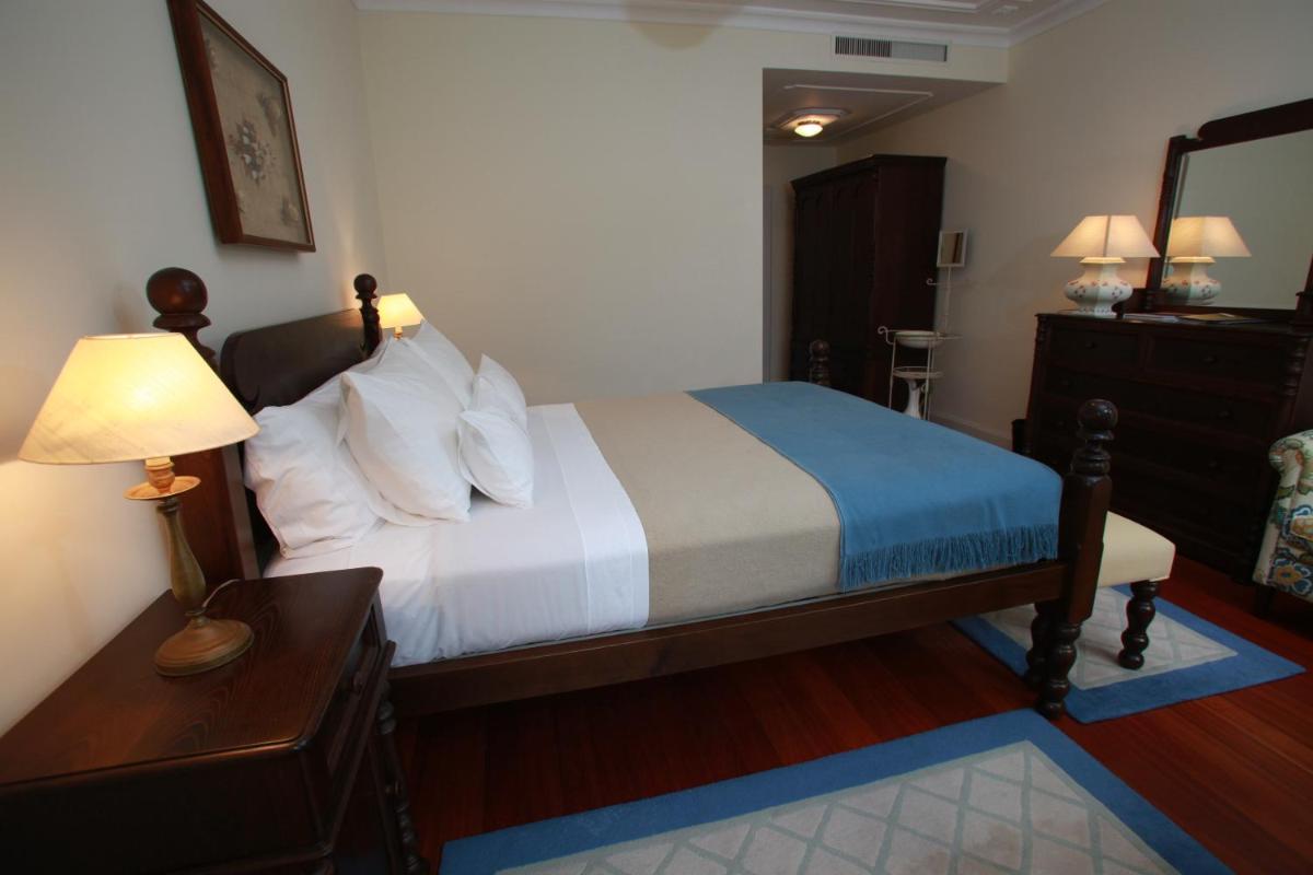 Uma cama ou camas num quarto em Estalagem do Vale