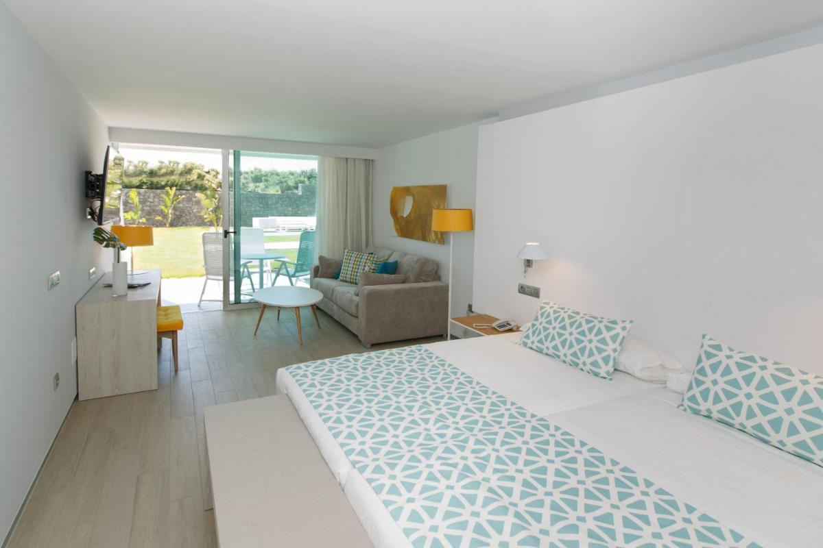 Cama o camas de una habitación en Santa Monica Suites Hotel