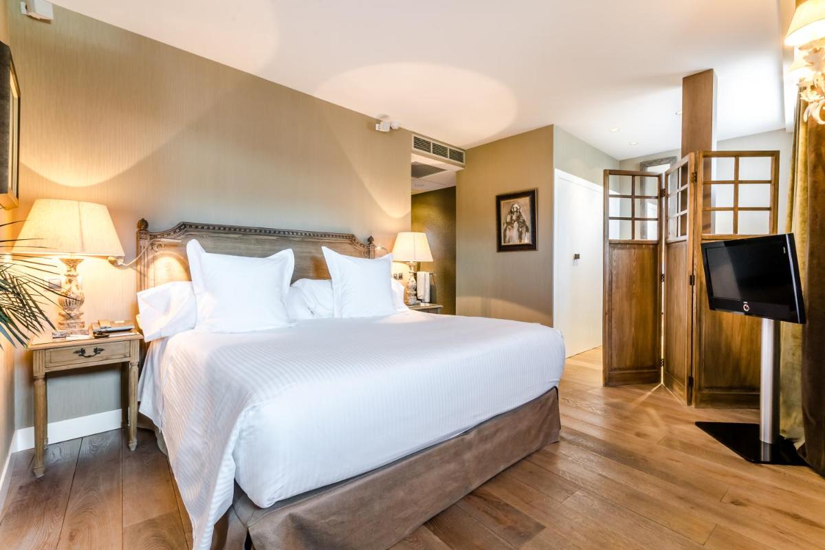 Cama o camas de una habitación en Grand Hotel Don Gregorio