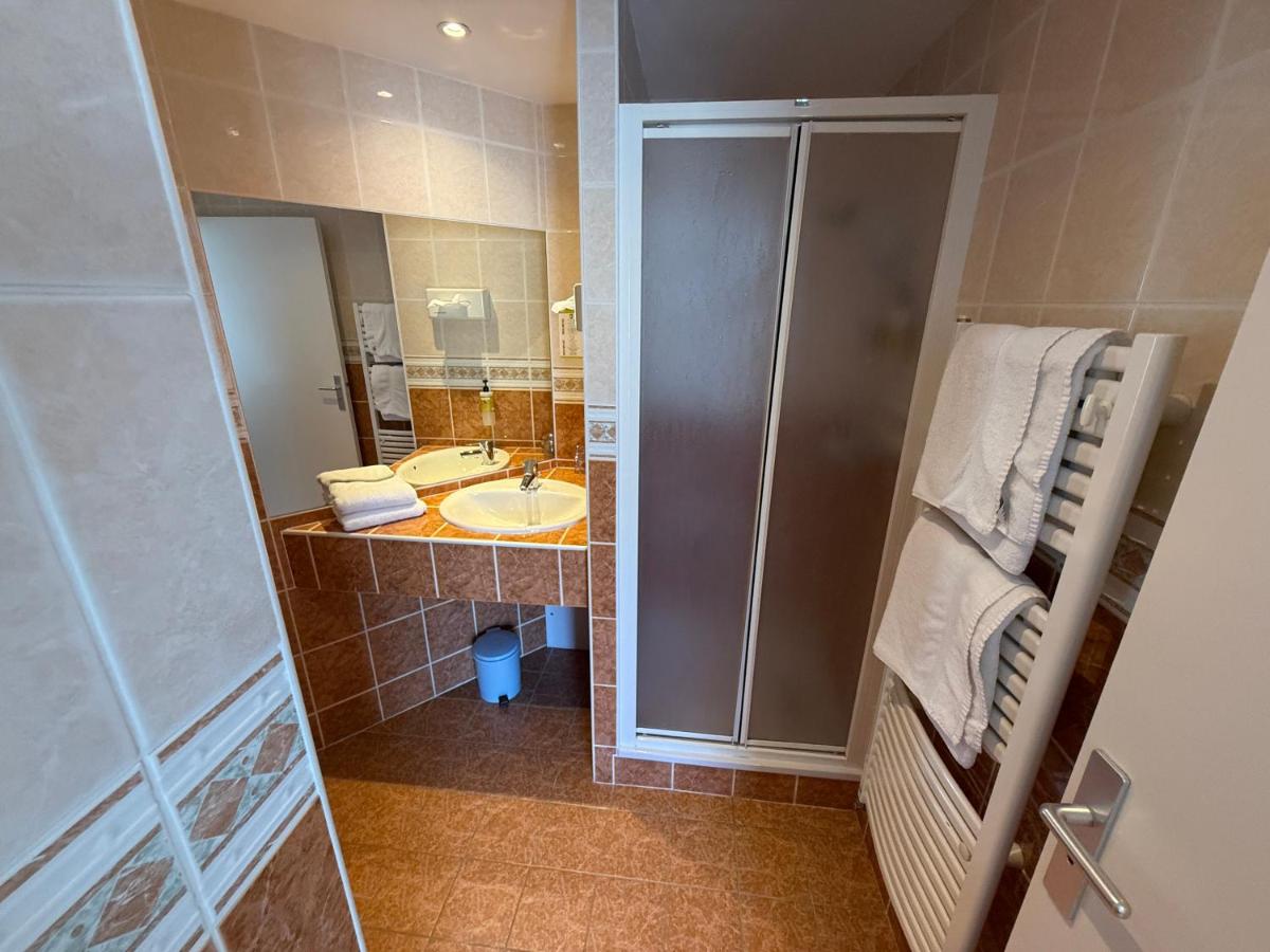 Salle de bains dans l'établissement Hôtel Édenia - Spa Estime&Sens