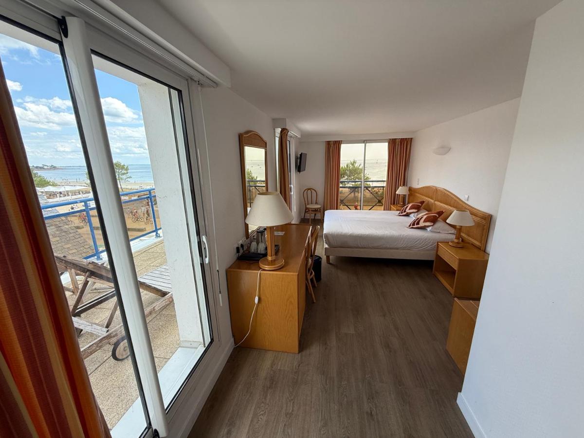 Un ou plusieurs lits dans un hébergement de l'établissement Hôtel Édenia - Spa Estime&Sens