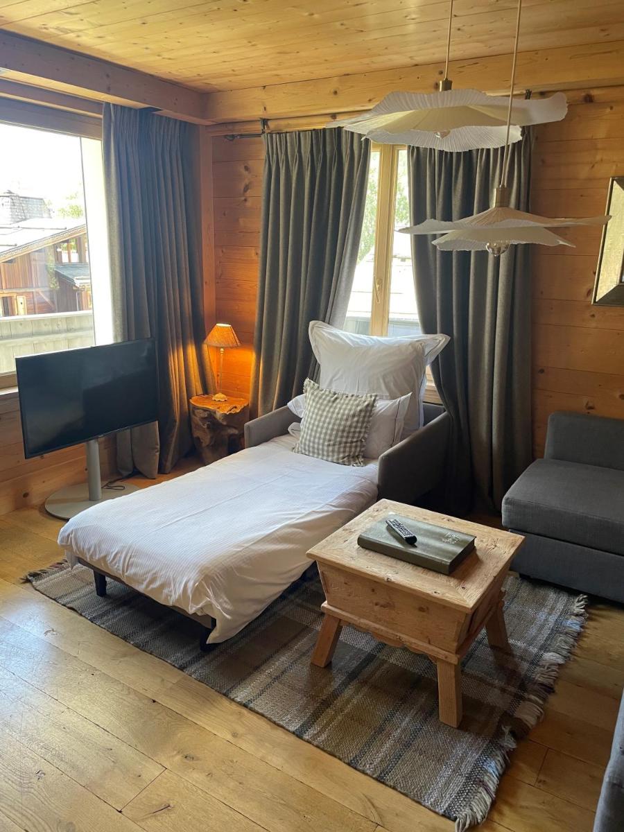 Un ou plusieurs lits dans un hébergement de l'établissement Chalet-Hôtel Hermitage