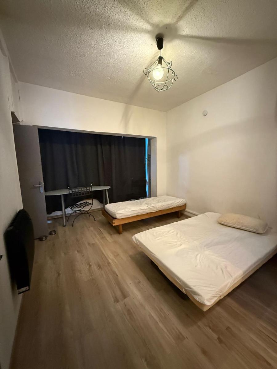 Cœur de ville au 1er 66M2, vu sur la place - Housity