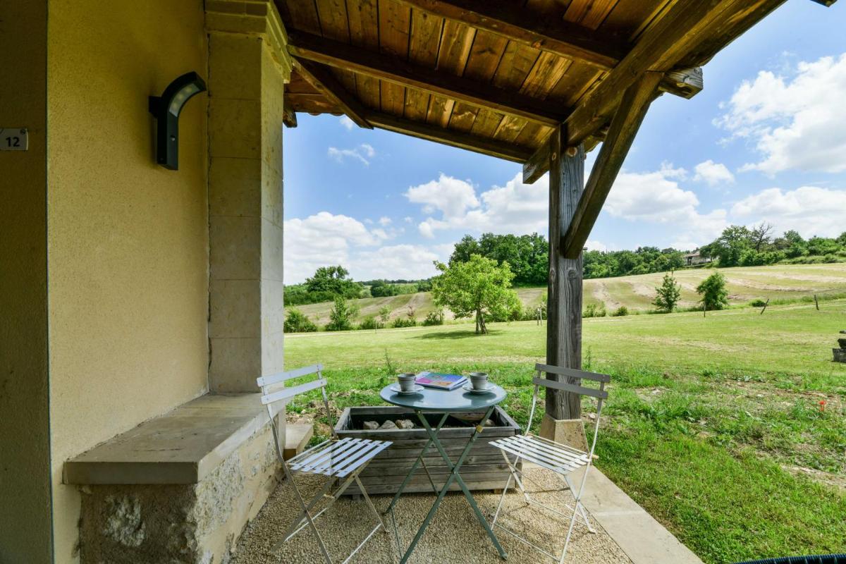 Jardin de l'établissement Logis L'Auberge de Larressingle