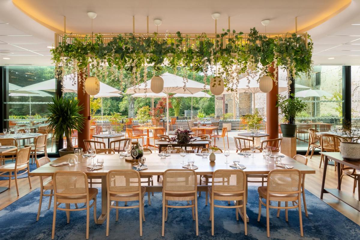 Restaurant ou autre lieu de restauration dans l'établissement La Maison OBONO Hôtel & Spa
