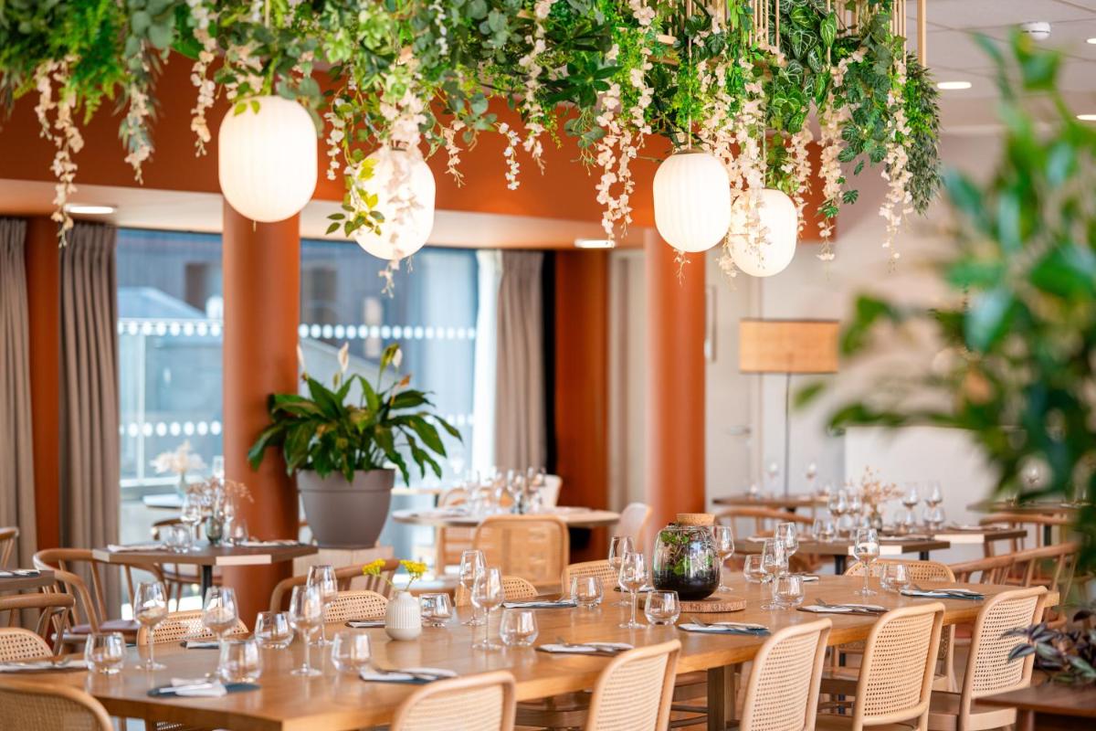 Restaurant ou autre lieu de restauration dans l'établissement La Maison OBONO Hôtel & Spa
