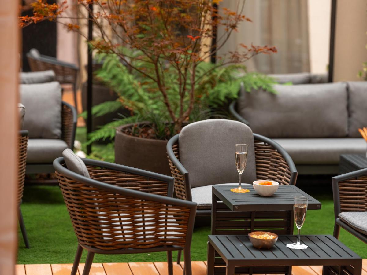 Coin salon dans l'établissement Hôtel Barnett Paris