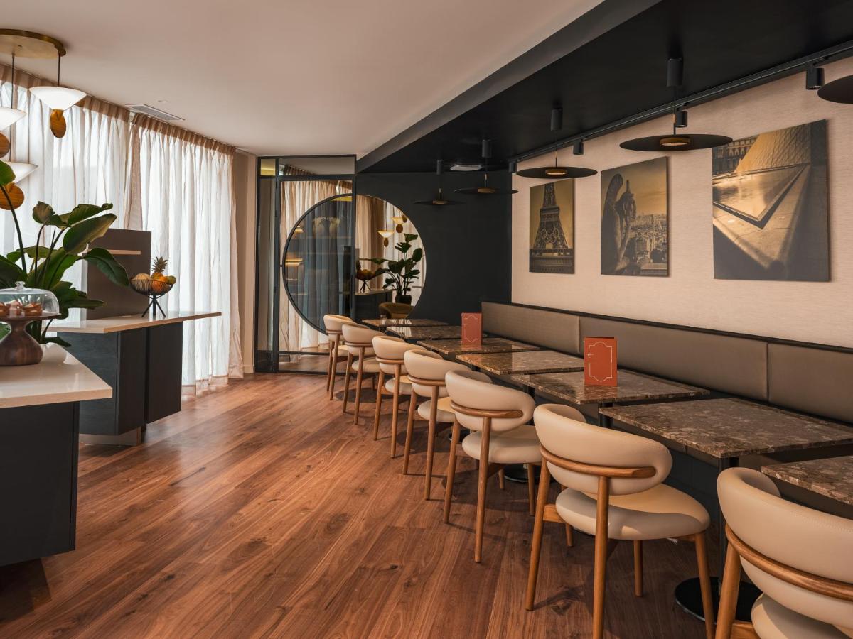Coin salon dans l'établissement Hôtel Barnett Paris