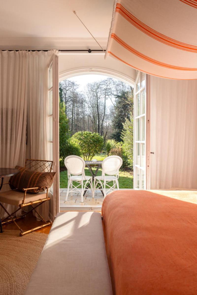 Un ou plusieurs lits dans un hébergement de l'établissement Brindos, Lac & Château - Relais & Châteaux - Anglet Biarritz