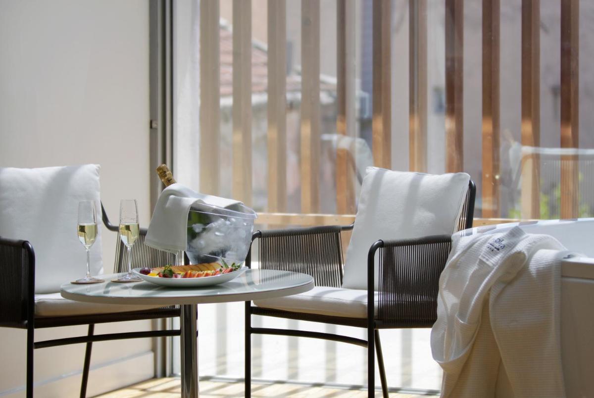 Uma área de estar em Inspira Liberdade Boutique Hotel