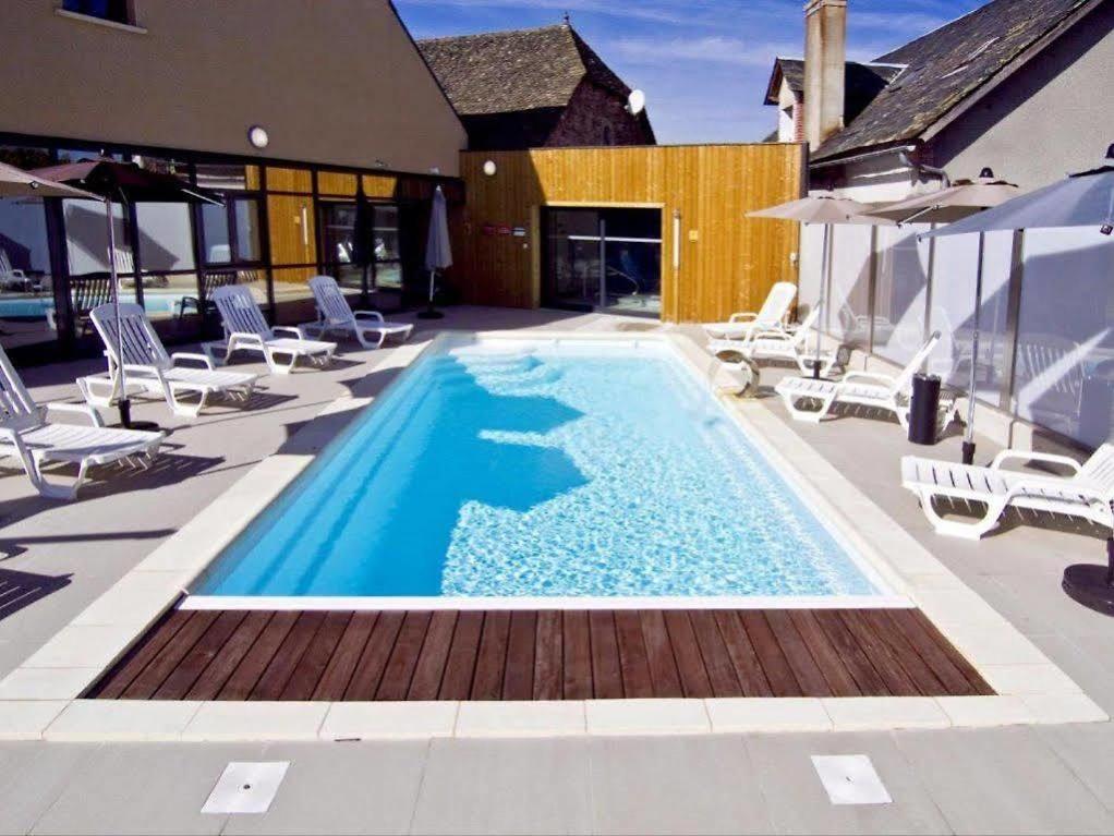 Piscine de l'établissement Logis Hôtel Restaurant Auberge de la Xaintrie ou située à proximité