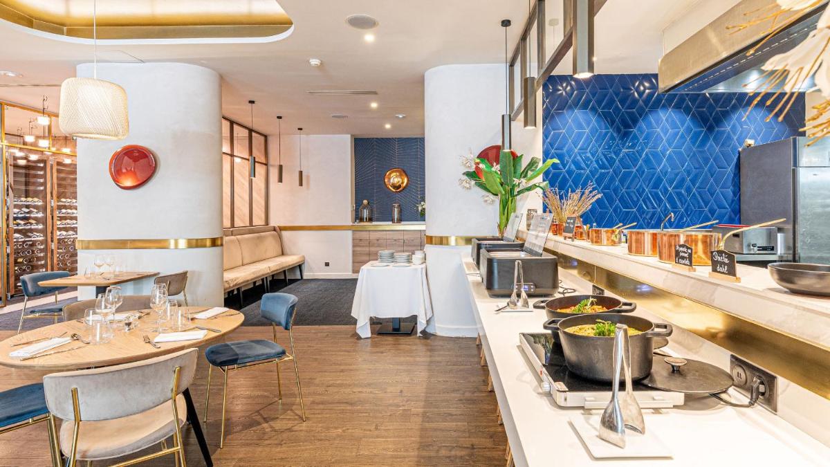 Cuisine ou kitchenette dans l'établissement Le Riviera - Hôtel Restaurant & Spa - Ex Golden Tulip Aix les bains