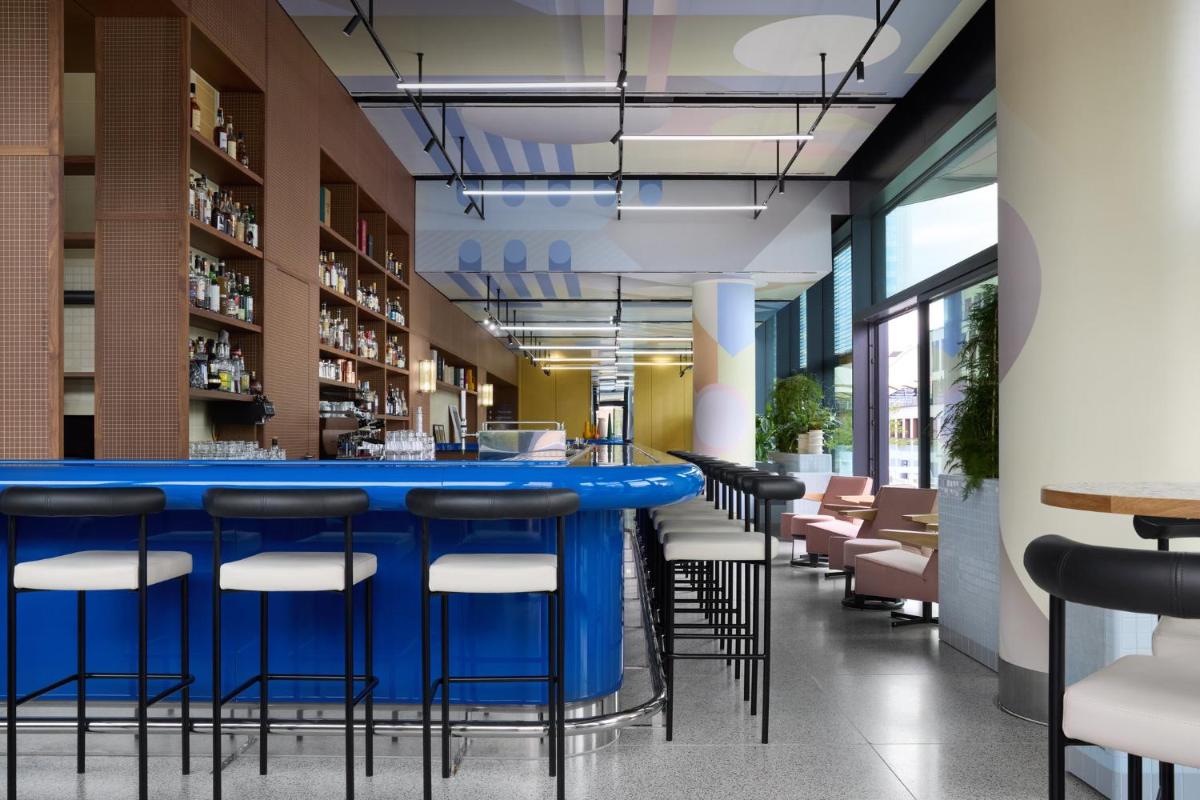 Ein Restaurant oder anderes Speiselokal in der Unterkunft Kimpton Main Frankfurt by IHG