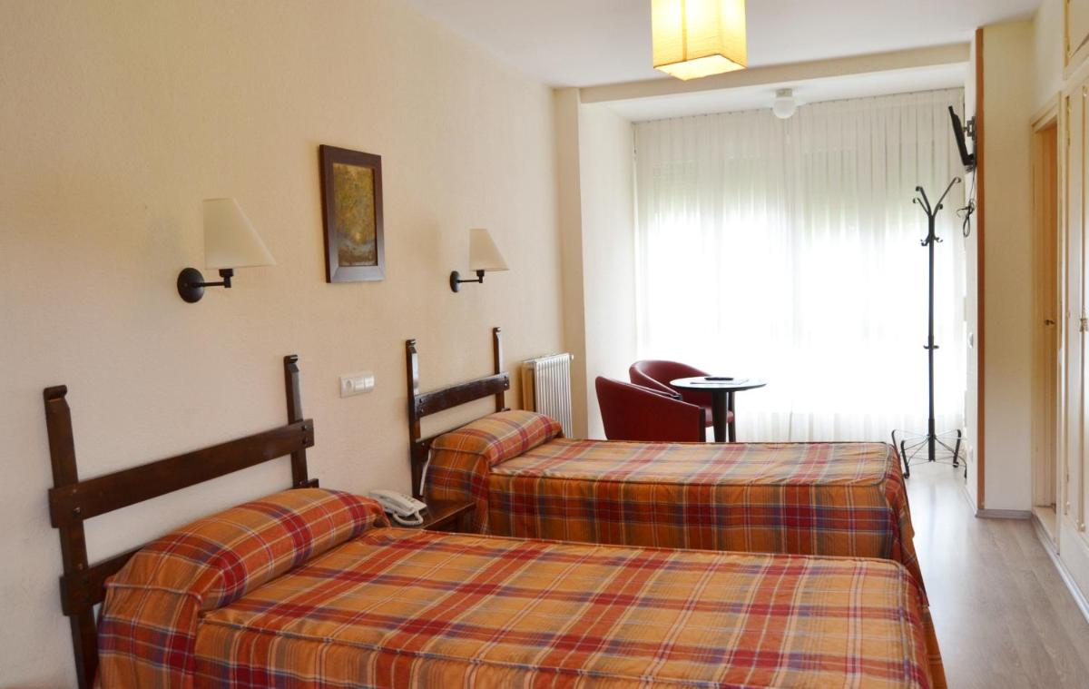 Cama o camas de una habitación en Hotel Termas de Liérganes