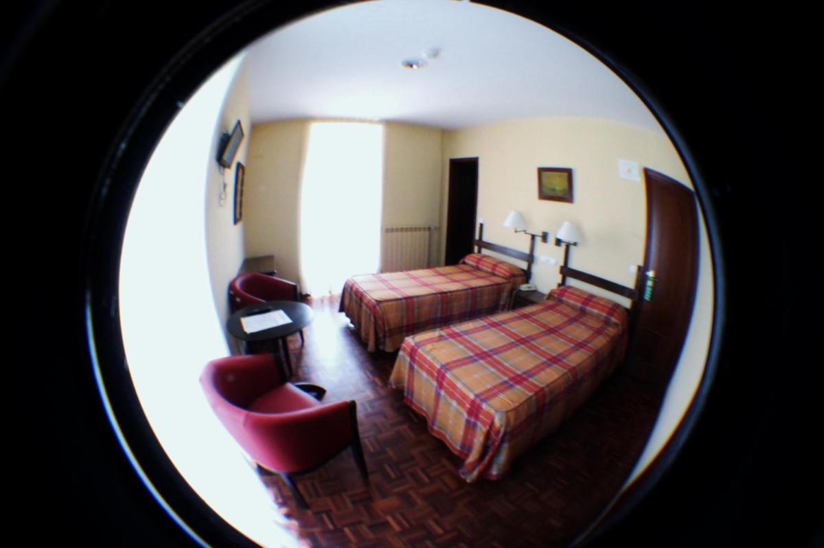 Cama o camas de una habitación en Hotel Termas de Liérganes