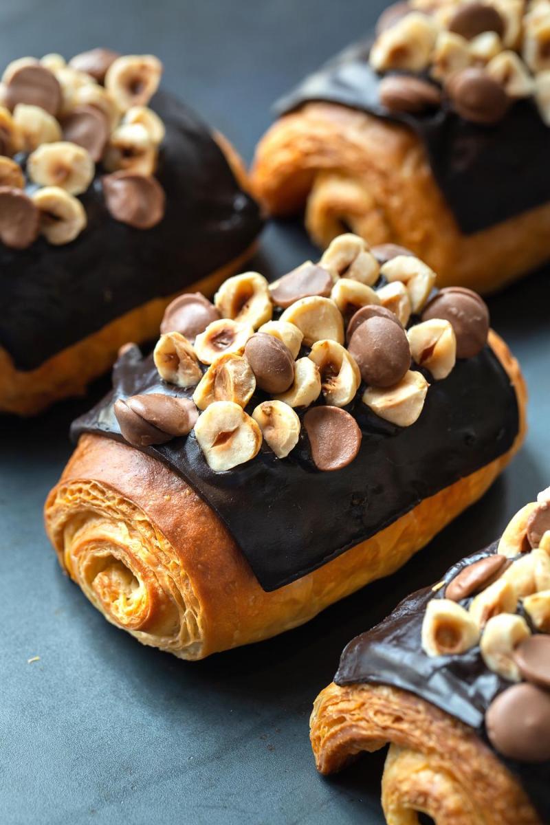 a group of pastries with nuts on top of them at Hyatt Regency Jaipur Mansarovar in Jaipur a group of pastries with nuts on top of them at Hyatt Regency Jaipur Mansarovar in Jaipur