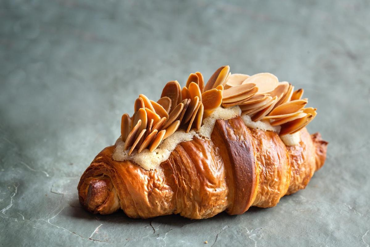 a loaf of bread with toppings on top of it at Hyatt Regency Jaipur Mansarovar in Jaipur a loaf of bread with toppings on top of it at Hyatt Regency Jaipur Mansarovar in Jaipur