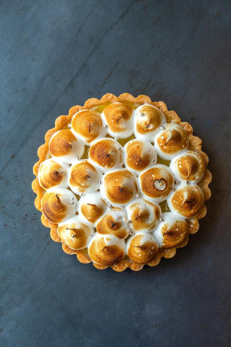 a pie with white icing on a table at Hyatt Regency Jaipur Mansarovar in Jaipur a pie with white icing on a table at Hyatt Regency Jaipur Mansarovar in Jaipur