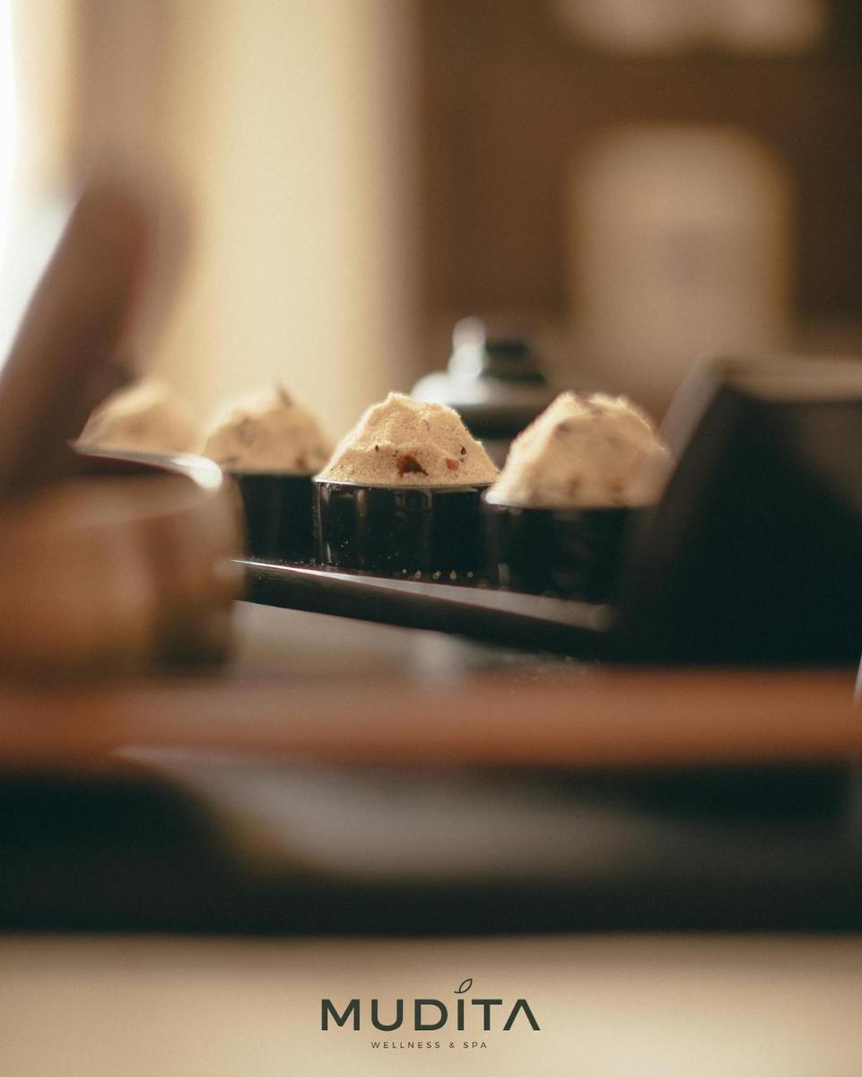 a plate of muffins sitting on a table at Hyatt Regency Jaipur Mansarovar in Jaipur a plate of muffins sitting on a table at Hyatt Regency Jaipur Mansarovar in Jaipur