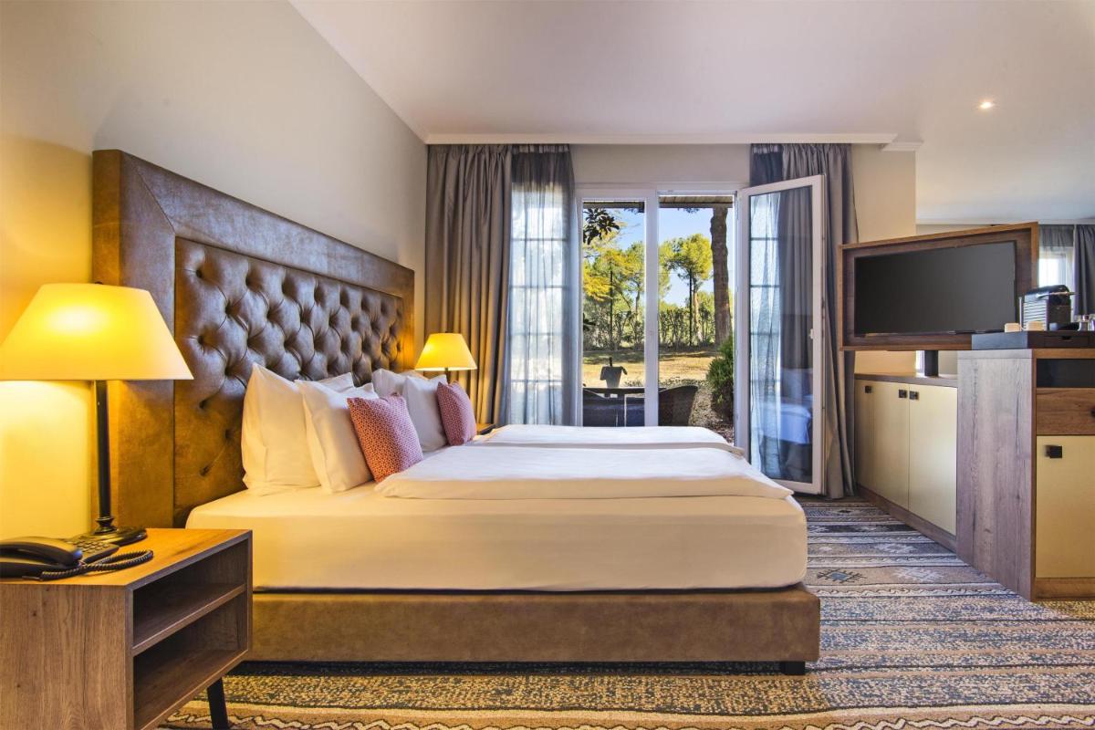 Cama o camas de una habitación en Lindner Hotel Mallorca Portals Nous, part of JdV by Hyatt